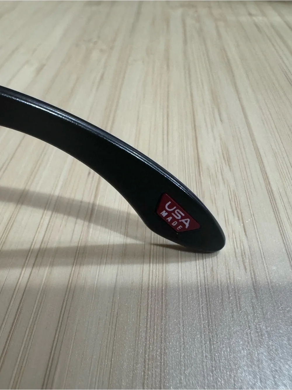 Oakley Black Sunglasses with Red Stripe and Gold Hardware